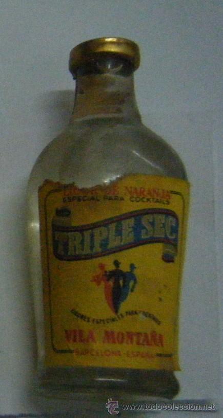 Coleccionismo de vinos y licores: BOTELLIN DE LICOR DE NARANJA TRIPLE SEC VILA MONTANA    RF-48
