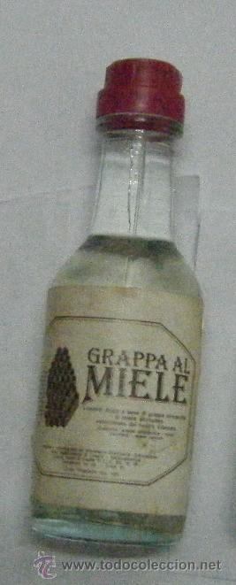 Coleccionismo de vinos y licores: BOTELLIN DE LICOR-LIQUEUR GRAPPA AL MIELE.DESTILERIA MORANDINI  RF-223