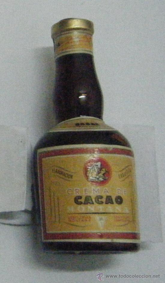 Coleccionismo de vinos y licores: BOTELLIN DE LICOR-LIQUEUR CREMA DE CACAO. DESTILERIA MONTA&Ntilde;A. BARCELONA. RF-720.