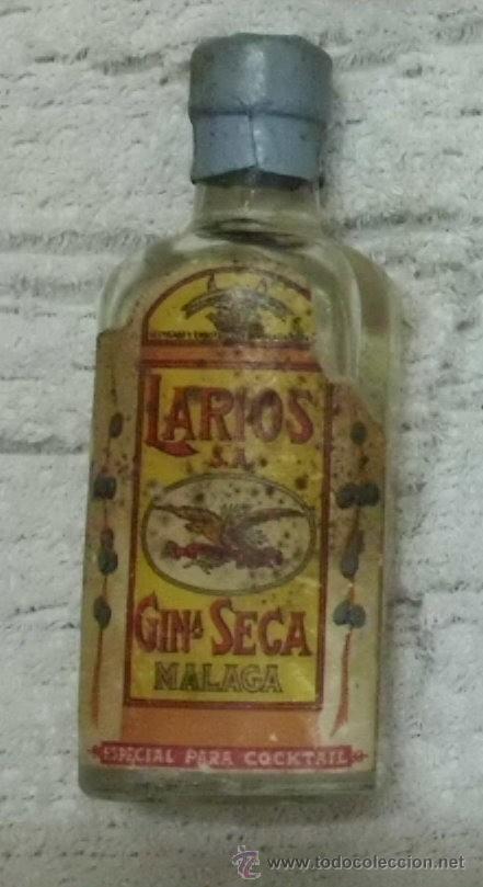 Coleccionismo de vinos y licores: BOTELLIN GINEBRA SECA. LARIOS S. A. MALAGA     RF-1295