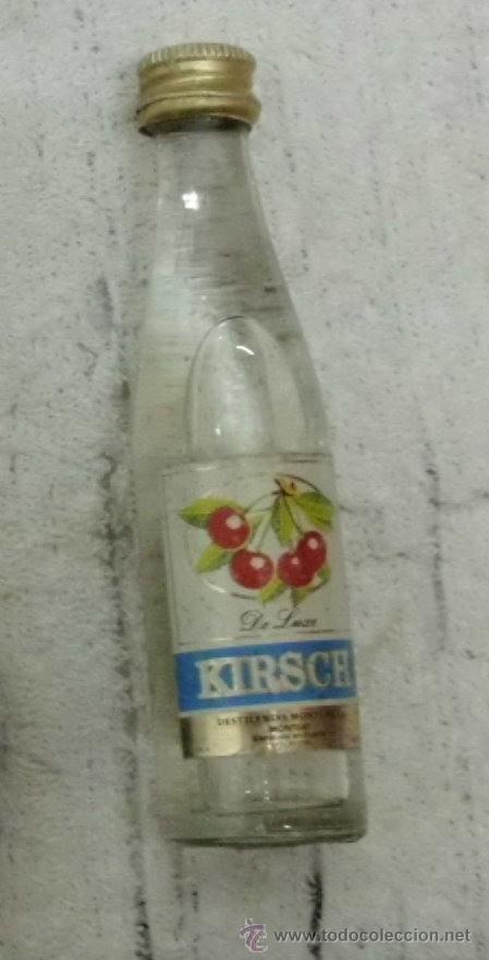 Coleccionismo de vinos y licores: BOTELLIN DE LICOR KIRSCH. DESTILERIA MONTGAT S. A. BARCELONA RF-1523