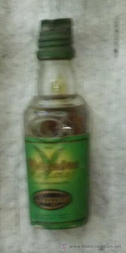 Coleccionismo de vinos y licores: BOTELLIN DE LICOR VEVEINE. DESTILERIA DU VELAY. FRANCIA     RF-1663