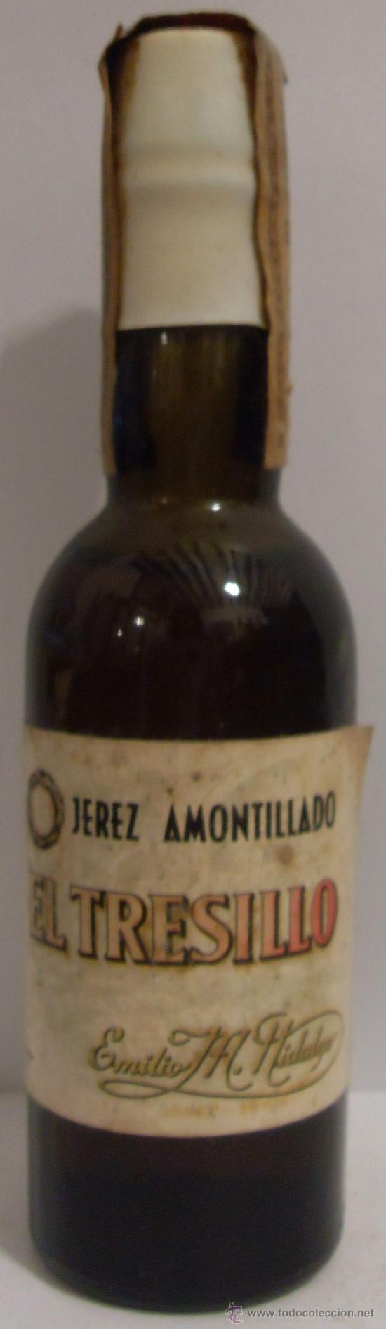 Coleccionismo de vinos y licores: BOTELLIN DE VINO DE JEREZ AMONTILLADO EL TRESILLO. BODEGAS EMILIO M. HIDALGO. JEREZ DE LA FRA.