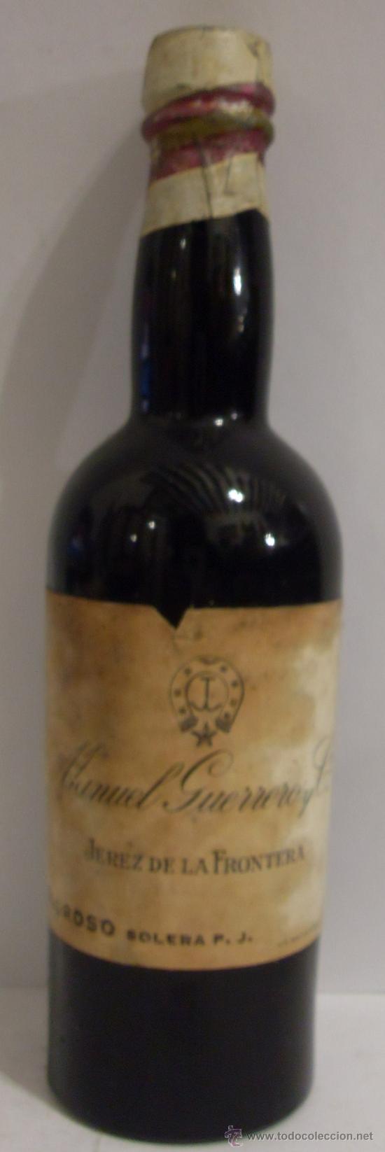 Colecionismo de vinhos e licores: BOTELLIN DE VINO DE JEREZ OLOROSO SOLERA. BODEGAS MANUEL GUERRERO Y C&ordf;. JEREZ DE LA FRA. CADIZ.