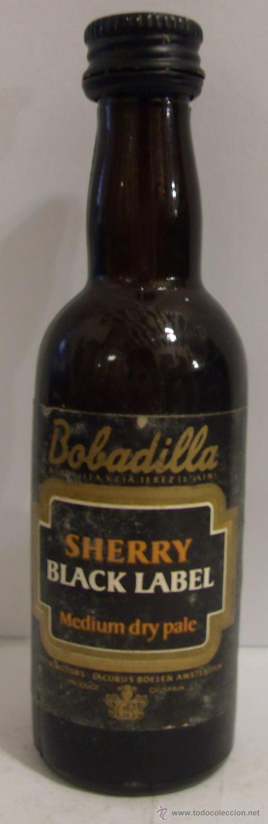 Sammlung von Weinen und Lik&ouml;ren: BOTELLIN DE VINO DE JEREZ OLOROSO DON PUYAZO. BODEGA ANTONIO MU&Ntilde;OZ. JEREZ DE LA FRA. CADIZ.