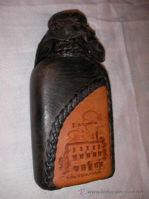 Collection of wines and liquors: BOTELLA FORRADA EN PIEL PARA WHISKY U OTROS LICORES