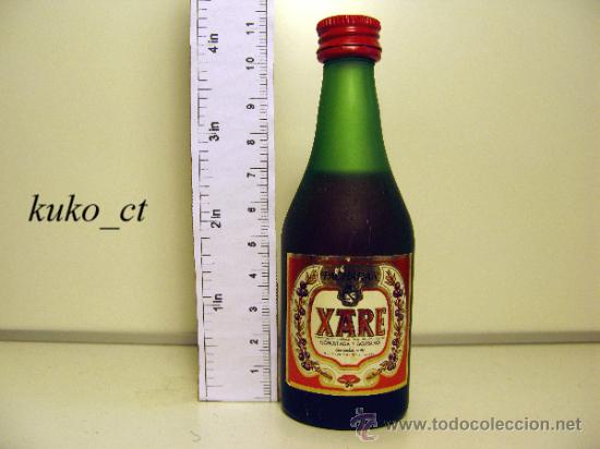 Collection of wines and liquors: BOTELLITA BOTELLIN PACHARAN XARE BODEGAS GOROSTIAGA Y GOITISOLO