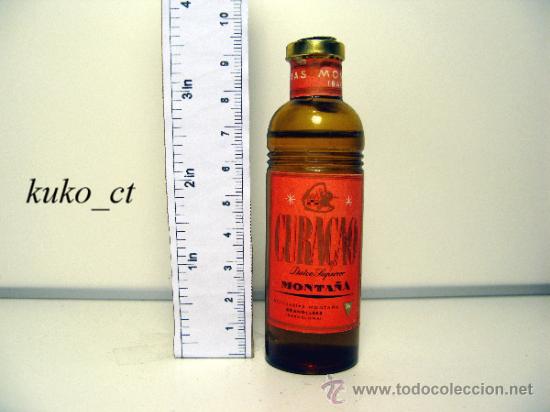Sammlung von Weinen und Lik&ouml;ren: BOTELLITA BOTELLIN CURACAO DULCE SUPERIOR MONTA&Ntilde;A DESTILERIAS MONTA&Ntilde;A