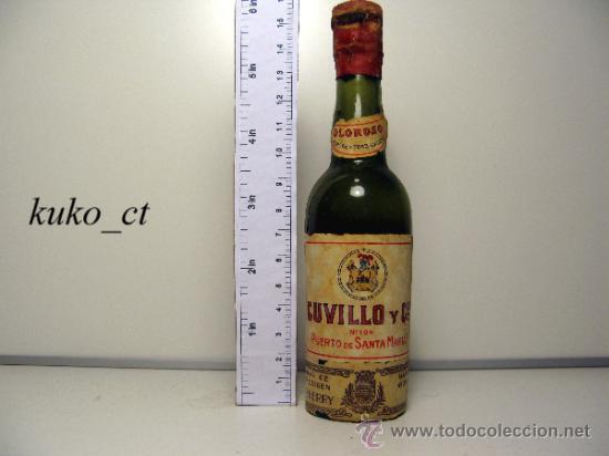 Collection of wines and liquors: BOTELLITA BOTELLIN OLOROSO SANGRE Y TRABAJADERO CUVILLO Y Cia N 194 PUERTO DE SANTA MARIA