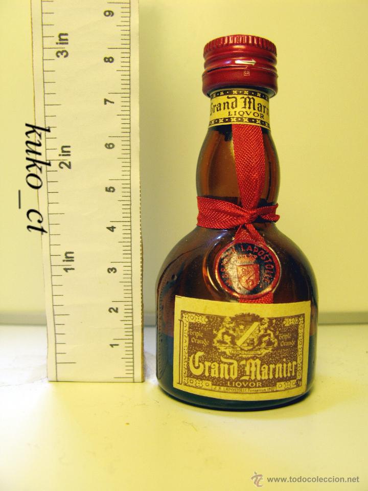 Sammlung von Weinen und Lik&ouml;ren: BOTELLITA BOTELLIN GRAND MARNIER TRIPLE ORANGE LIQVOR J.B. LAPOSTOLLE