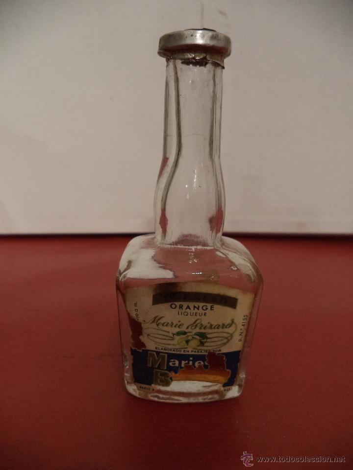 Collection of wines and liquors: BOTELLIN DE CURA&Ccedil;AO LIQUEUR ORANGE. MARIE BRIZARD.