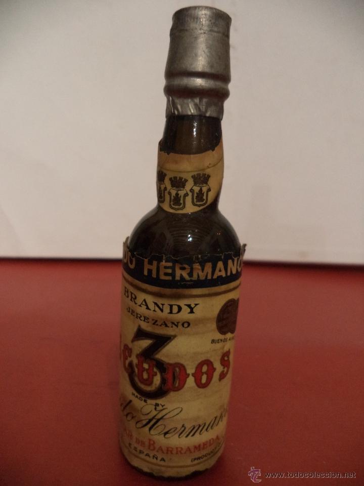 Colecionismo de vinhos e licores: BOTELLIN  DE BRANDY JEREZANO 3 ESCUDOS.  FLORIDO HERMANOS. SANLUCAR DE  BARRAMEDA