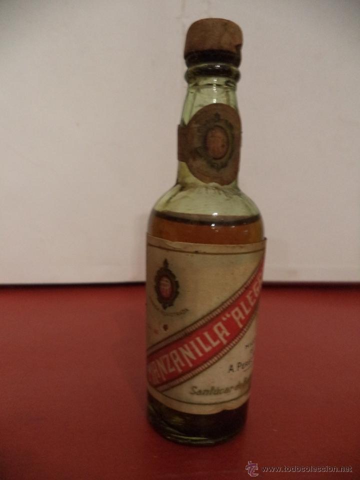 Colecionismo de vinhos e licores: BOTELLIN DE VINO MANZANILLA ALEGRIA. HIJOS DE PEREZ MEGIA. SANL&Uacute;CAR DE BARRAMEDA.