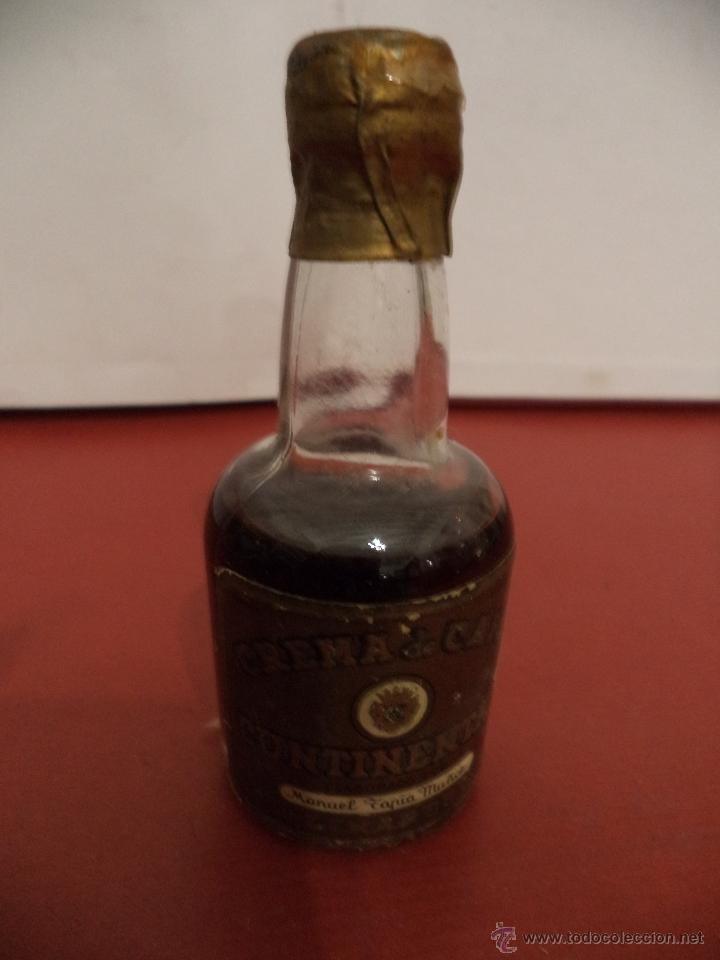 Coleccionismo de vinos y licores: BOTELLIN DE CREMA DE CAF&Eacute; CONTINENTAL. MANUEL TAPIA MU&Ntilde;OZ. LINARES, JA&Eacute;N.