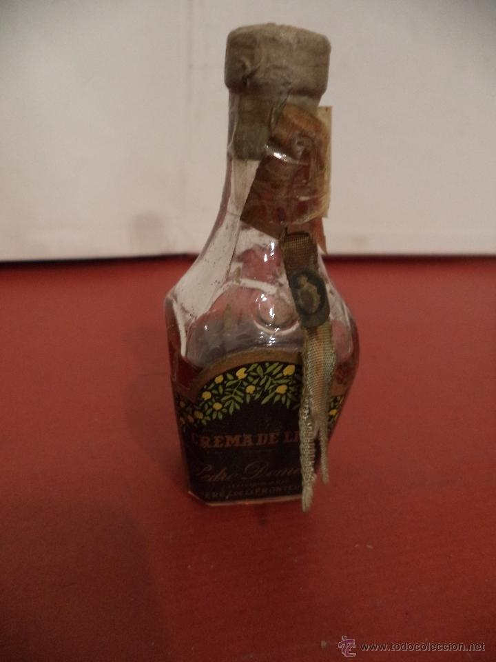 Coleccionismo de vinos y licores: BOTELLIN DE CREMA DE LIMA. PEDRO DOMECQ. JEREZ DE LA FRONTERA.