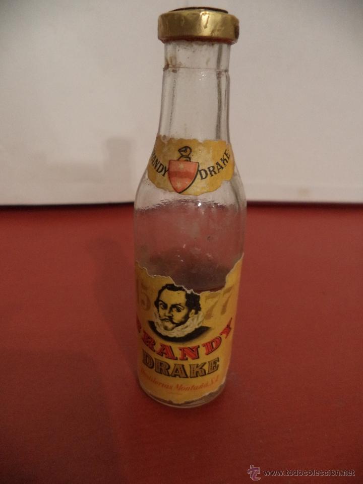 Coleccionismo de vinos y licores: BOTELLIN DE BRANDY DRAKE.DESTILER&Iacute;AS MONTA&Ntilde;A, S. A. ESPA&Ntilde;A.