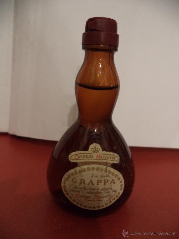 Collection of wines and liquors: BOTELLIN GRAPPA. CARPENE MALVOLTI. PRODUCTO DE ITALIA.