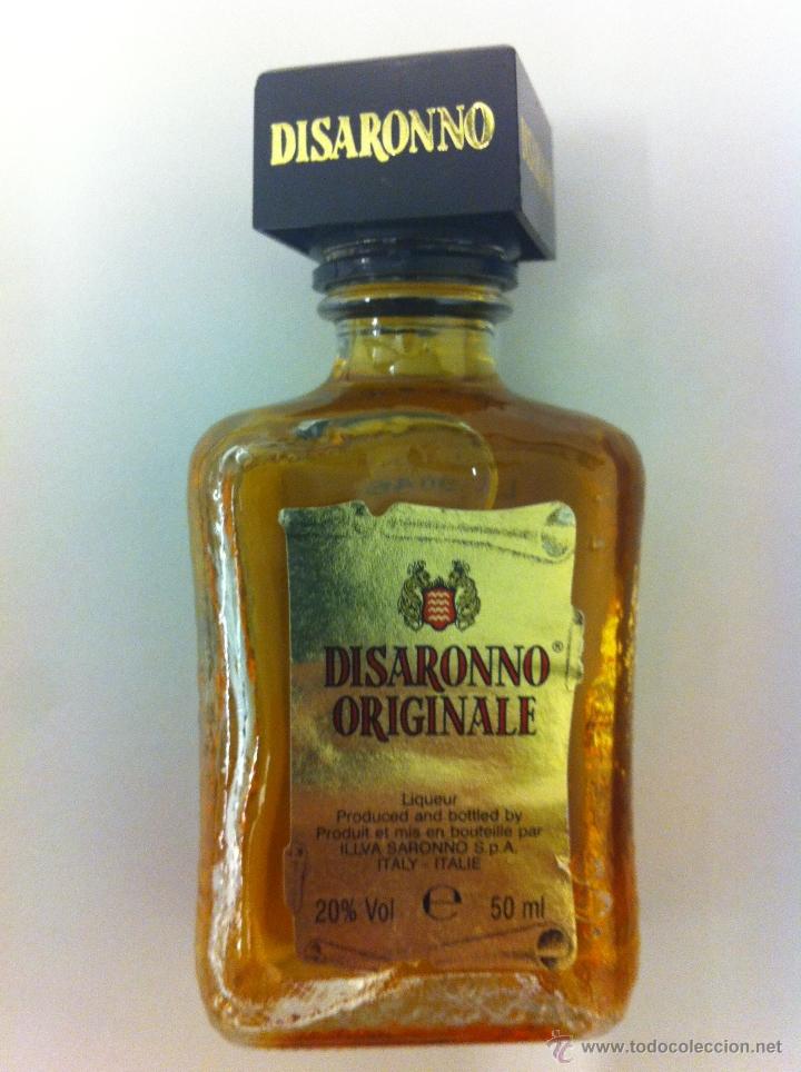 Coleccionismo de vinos y licores: BOTELLA MINIATURA CRISTAL DISARONNO ORIGINALE. CRISTAL  50 ML LLENA CON PRECINTO ROTO