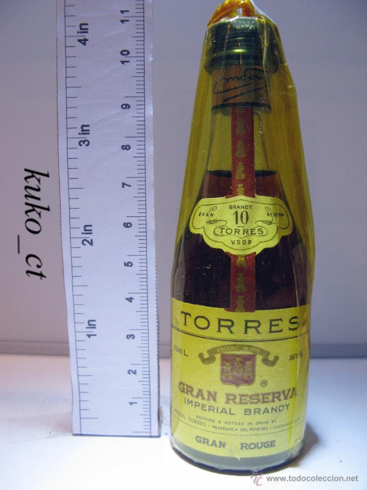Coleccionismo de vinos y licores: BOTELLITA BOTELLIN TORRES BRANDY RESERVA 10 A&Ntilde;OS DESTILADO MIGUEL TORRES VILAFRANCA DEL PENADES