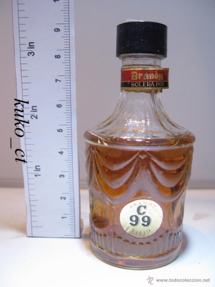 Coleccionismo de vinos y licores: BOTELLITA BOTELLIN BRANDY VIEJO C99 SOLERA 1956 ANTONIO GO&Ntilde;I
