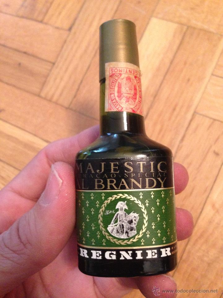 Coleccionismo de vinos y licores: ANTIGUO BOTELLIN MAJESTIC CURACAO SPECIAL BRANDY REGNIER
