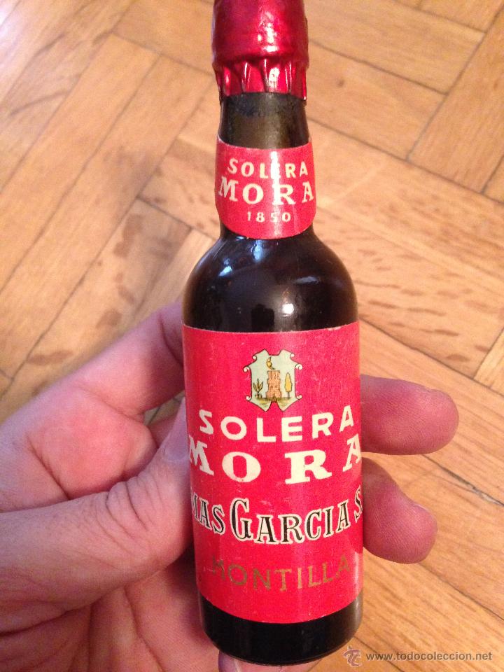 Coleccionismo de vinos y licores: ANTIGUO BOTELLIN VINO SOLERA MORA MONTILLA