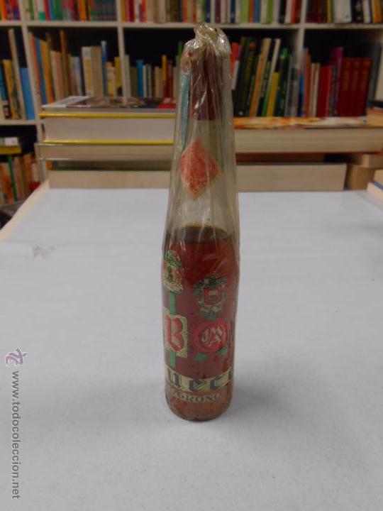 Collection of wines and liquors: BOTELLA ZUECO. DESTILERIAS LA RIOJANA. LOGRO&Ntilde;O.