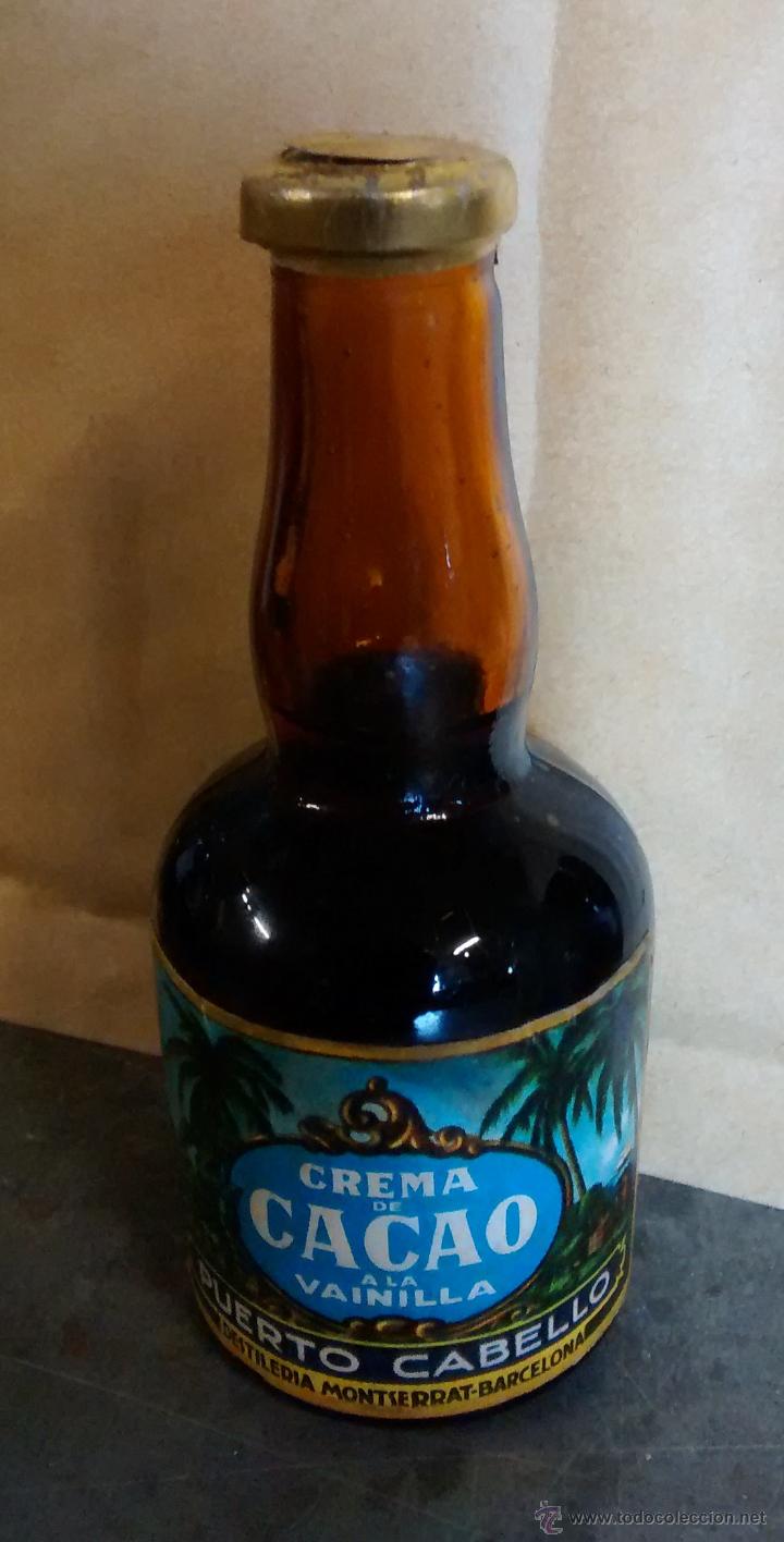 Collection of wines and liquors: Botellita Crema de cacao a la vainilla, Puerto Cabello, Destileria Montserrat Barcelona