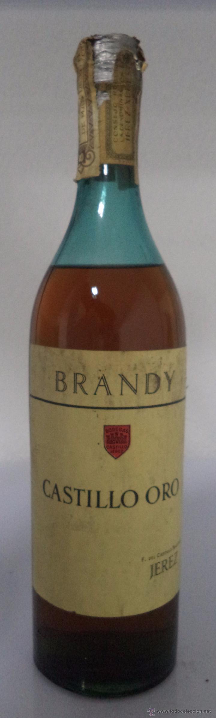 Coleccionismo de vinos y licores: BOTELLA BRANDY CASTILLO ORO. BODEGA CASTILLO BAQUERO. 80 CENTIMOS. - Foto 1