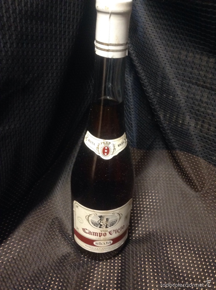 Collection of wines and liquors: Antigua botella - vino de rioja - rosado - bodegas campo viejo