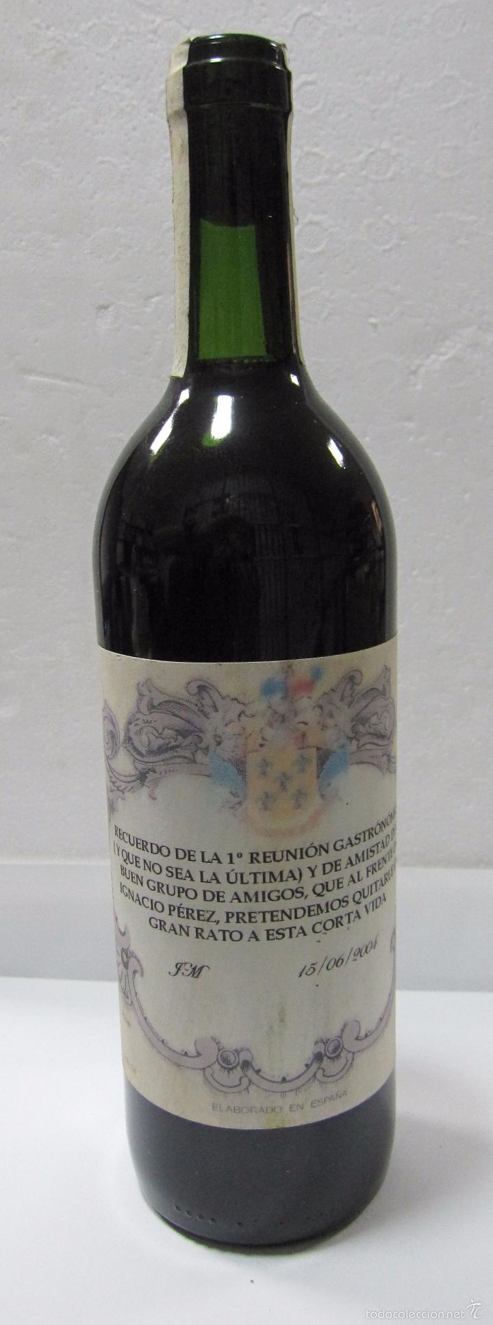 Collection of wines and liquors: BOTELLA DE VINO RECUERDO DE 1&ordf; REUNI&Oacute;N GASTRON&Oacute;MICA AL FRENTE DE IGNACIO PEREZ. 2004.