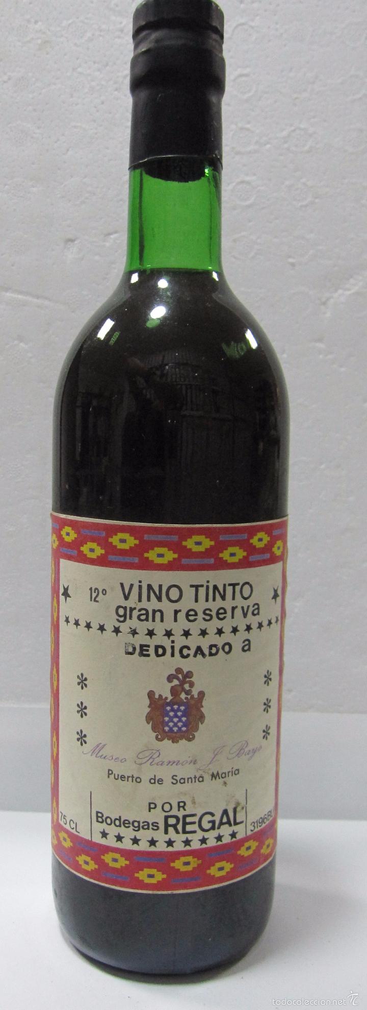 Collection of wines and liquors: BOTELLA DE VINO TINTO GRAN RESERVA. DEDICADO A MUSEO RAMON J. BAYO. PTO. STA. M&ordf;. BODEGAS REGAL