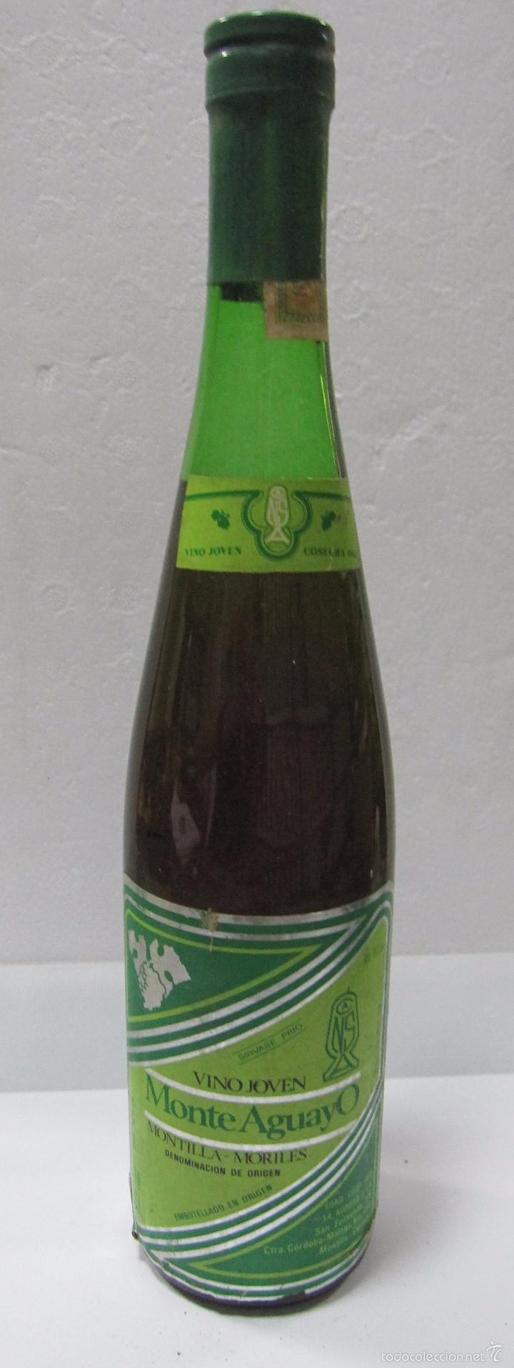 Collection of wines and liquors: BOTELLA DE VINO JOVEN. MONTE AGUAYO. MONTILLA. MORILES. COSECHA 1986. 32,5 CM DE ALTO.