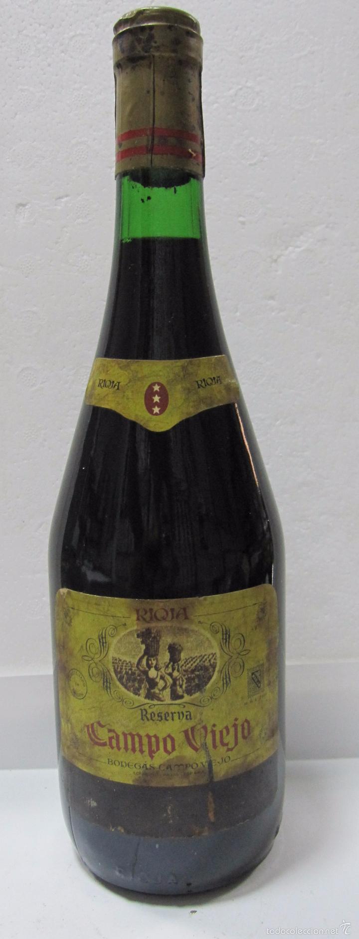 Collection of wines and liquors: BOTELLA DE VINO RIOJA RESERVA. CAMPO VIEJO. BODEGAS CAMPO VIEJO. LOGRO&Ntilde;O. 29 CM DE ALTO