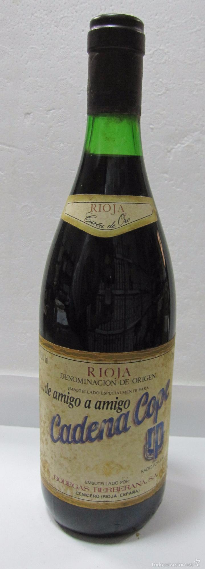 Sammlung von Weinen und Lik&ouml;ren: BOTELLA DE VINO RIOJA CARTA DE ORO. ESPECIAL PARA CADENA COPE. BODEGAS BERBERANAS. CENICERO.
