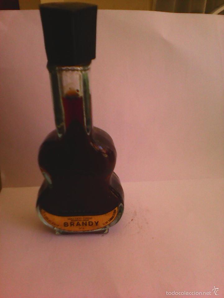 Collectionnisme de vins et liqueurs: BOTELLIN BRANDY NOGUERAS COMAS. BARCELONA.