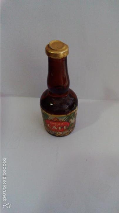 Colecionismo de vinhos e licores: BOTELLIN CREMA DE CAFE. PUERTO CABELLO. DESTILERIAS MONTSERRAT - BARCELONA.