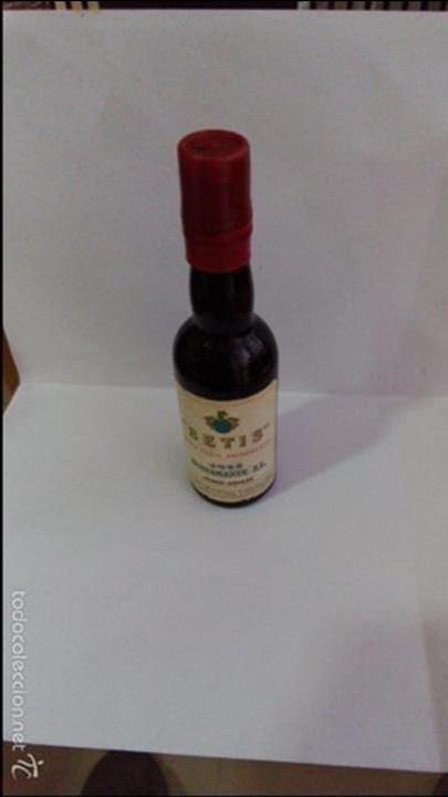 Coleccionismo de vinos y licores: BOTELLIN FINO AMONTILLADO. BETIS. JOSE BUSTAMANTE. S.L. JEREZ.