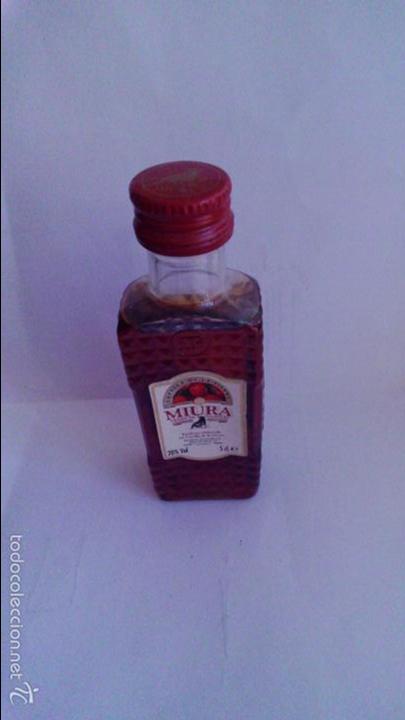 Sammlung von Weinen und Lik&ouml;ren: BOTELLIN MIURA CREMA DE GUINDAS.DESTILERIAS DE CAZALLA S.A