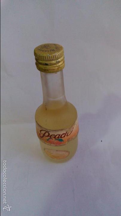 Coleccionismo de vinos y licores: BOTELLIN PEACH . MARIE BRIZARD.