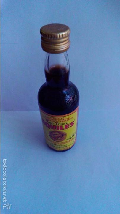 Coleccionismo de vinos y licores: BOTELLIN VINO TONICO AQUILES. BODEGAS QUITAPENAS S.L. MALAGA.