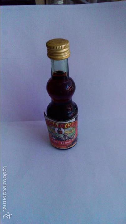 Coleccionismo de vinos y licores: BOTELLIN CREMA DE CAFE. CRUZ CONDE. PROMEKS INDUSTRIAL. S.A.