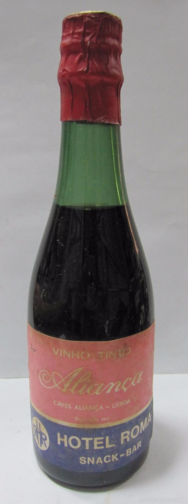 Coleccionismo de vinos y licores: BOTELLA DE VINHO TINTO. ALIAN&ccedil;A. LIBOA. HOTEL ROMA. 21 CM  DE ALTO.