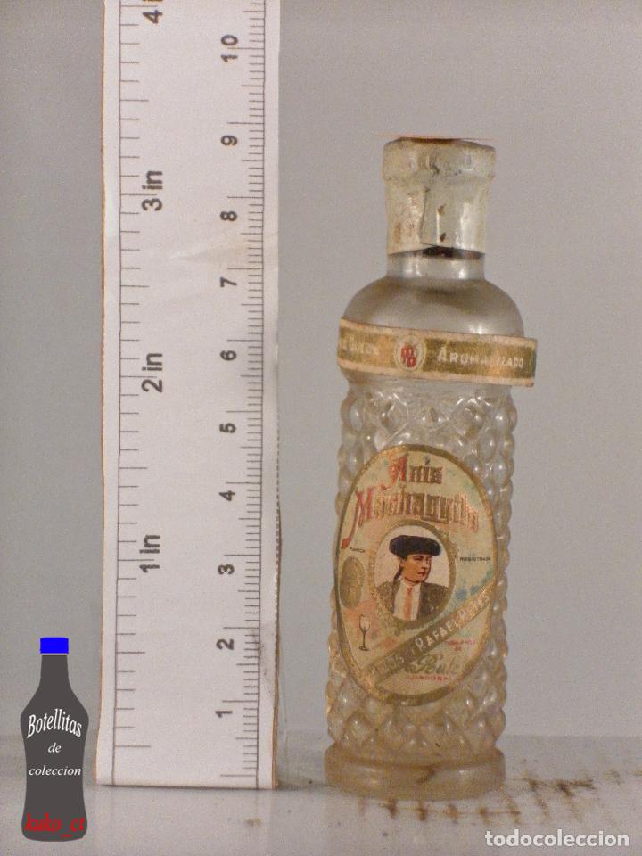 Collection of wines and liquors: BOTELLITA BOTELLIN ANIS MACHAQUITO HIJOS DE RAFAEL REYES RUTE