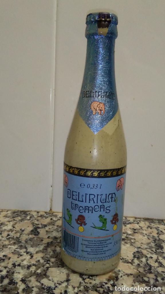 Coleccionismo de vinos y licores: BOTELLA CERVEZA DELIRUUM TROMRNS  ETIQUETAS DE PAPEL LIQUIDO ORIGINAL CHAPA CORONA
