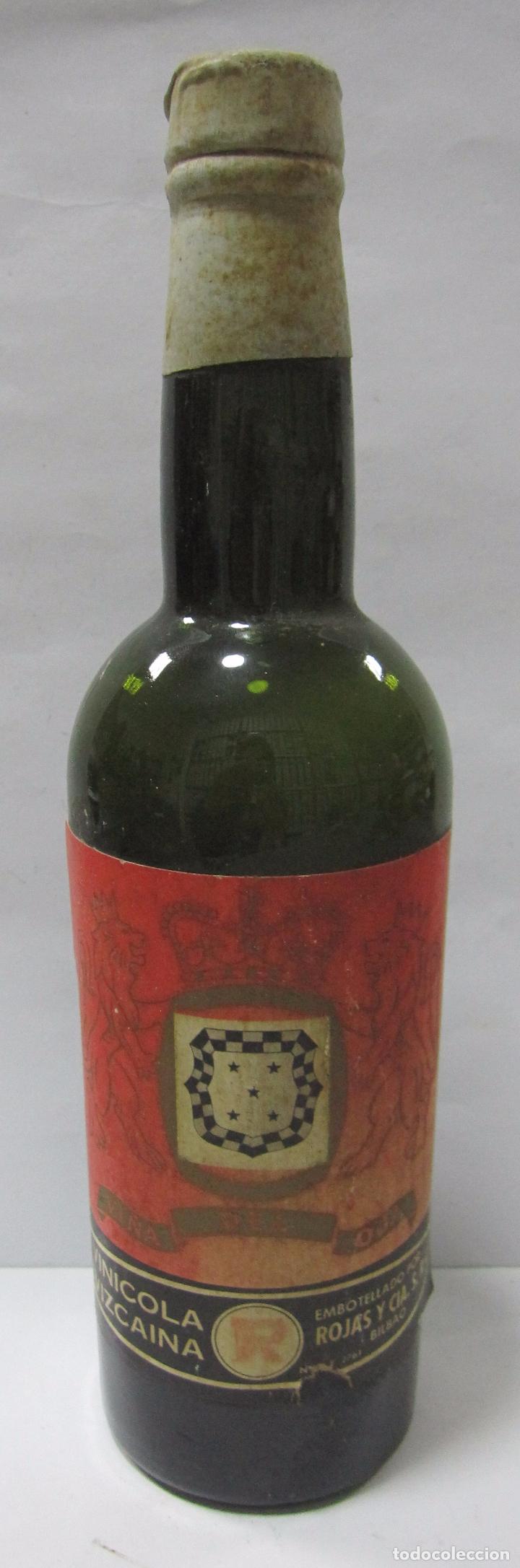 Coleccionismo de vinos y licores: BOTELLA DE MUESTRA DE VI&Ntilde;A DEL OJA. VIN&Iacute;COLA VIZCAINA. EMBOTELLADO POR ROJAS Y CIA. S.R.C. VAC&Iacute;A