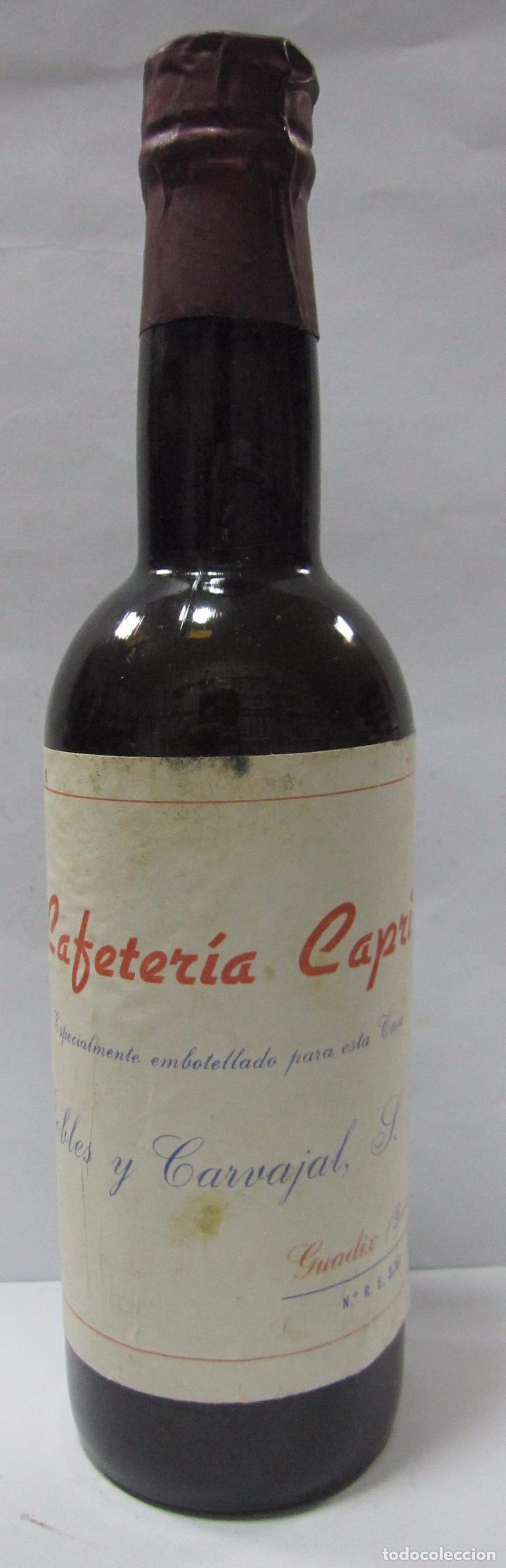 Coleccionismo de vinos y licores: BOTELLA DE MUESTRA DE VINO DE MESA. FACTORIA DE GRANADA. ROBLES Y CARVAJAL. 24,5 CM.VAC&Iacute;A