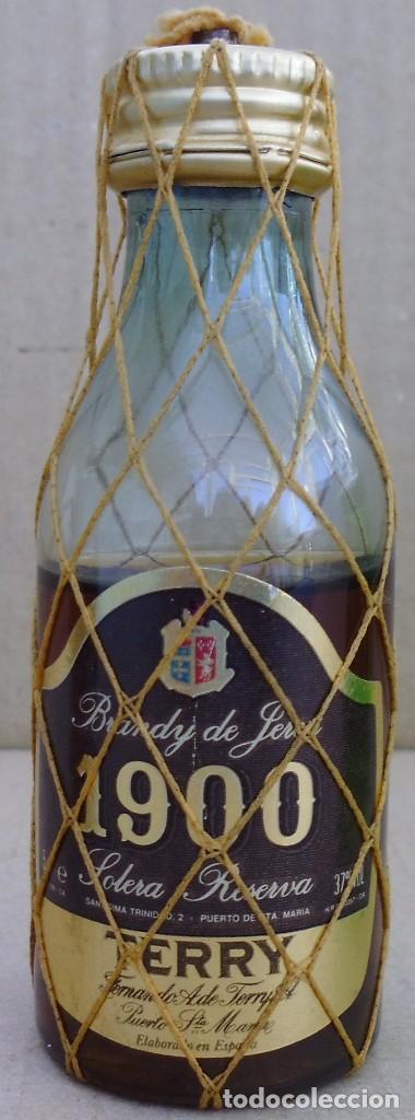 Coleccionismo de vinos y licores: BOTELLIN BRANDY 1900 - Foto 1