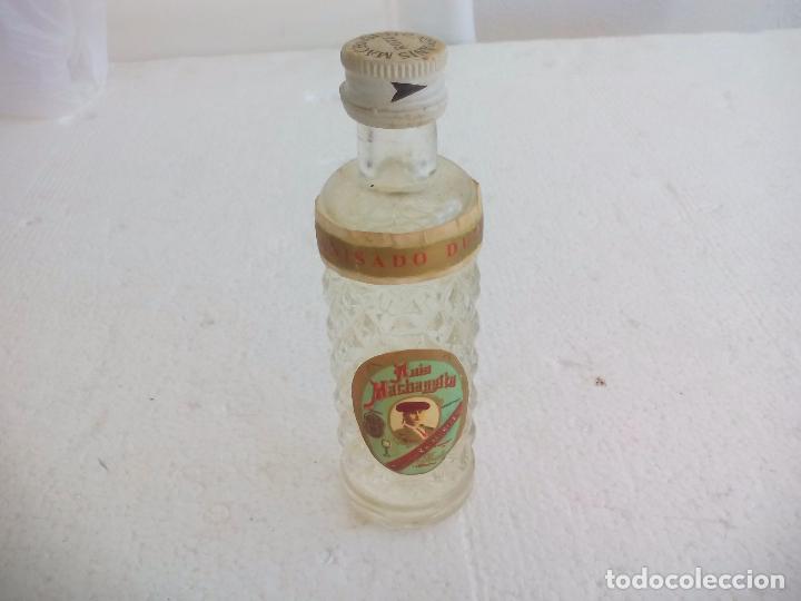 Coleccionismo de vinos y licores: Antigua botella o botellin de cristal en minaitura. Anis Machaquito Dulce.11cm Hijos de Rafael Reyes