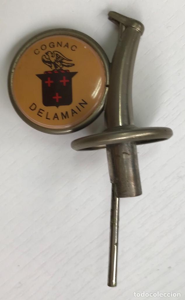 Sammlung von Weinen und Lik&ouml;ren: Raro tap&oacute;n dosificador de Cognac Delamain